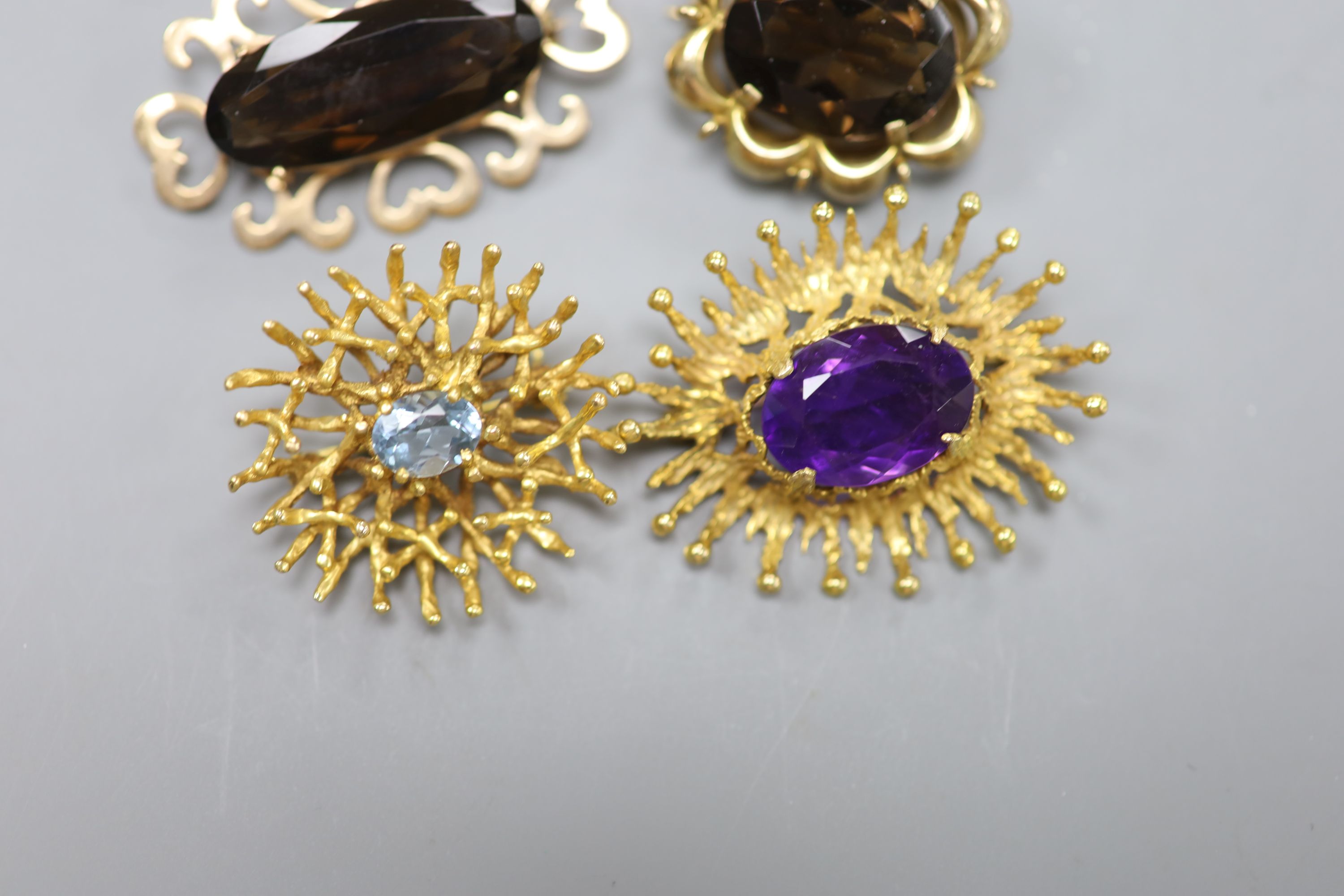 A modern 9ct white metal, sapphire, diamond and cultured pearl set bar brooch, 61mm and four other modern 9ct gold and gem set brooches, including amethyst and smoky quartz